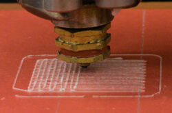A 3D printer creating a bone scaffold